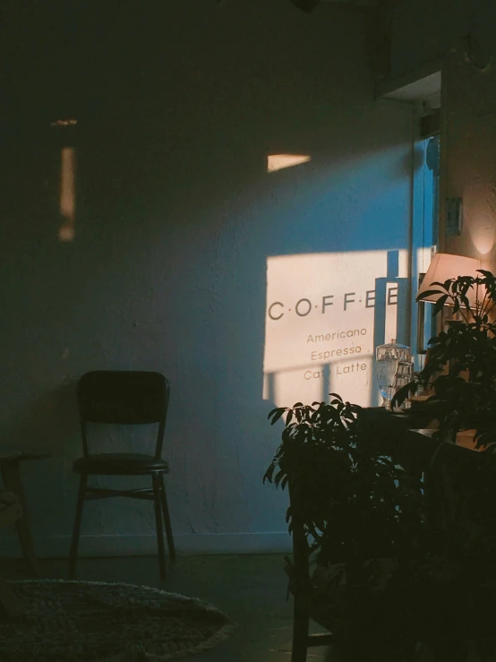 a coffee shop sign in a window of a coffee shop
