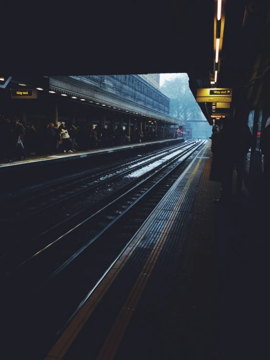 there are many railroad tracks at this train station