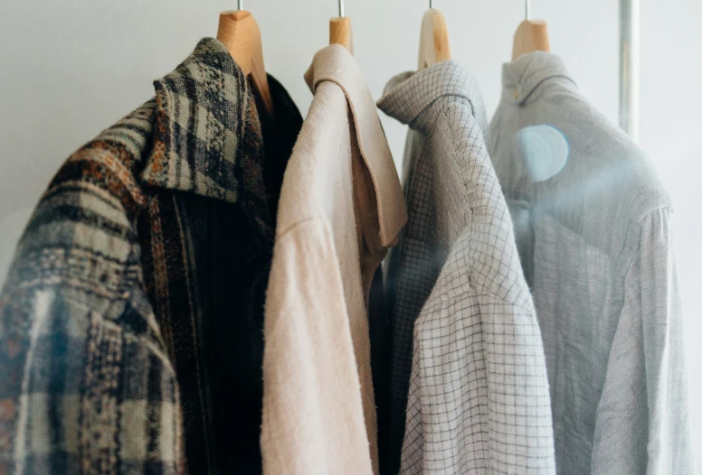 an image of towels and sweaters hanging from clothesline