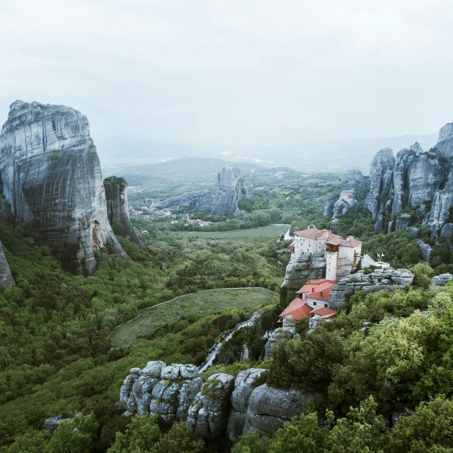 aerial s of mountaintop homes with lush foliage