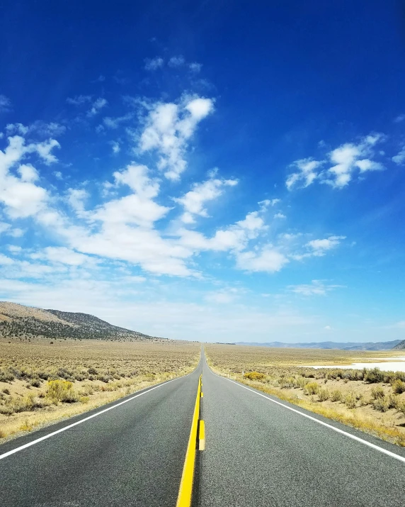 the view from a car driving down the highway