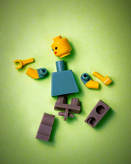 legos play with blocks and bricks on a green surface