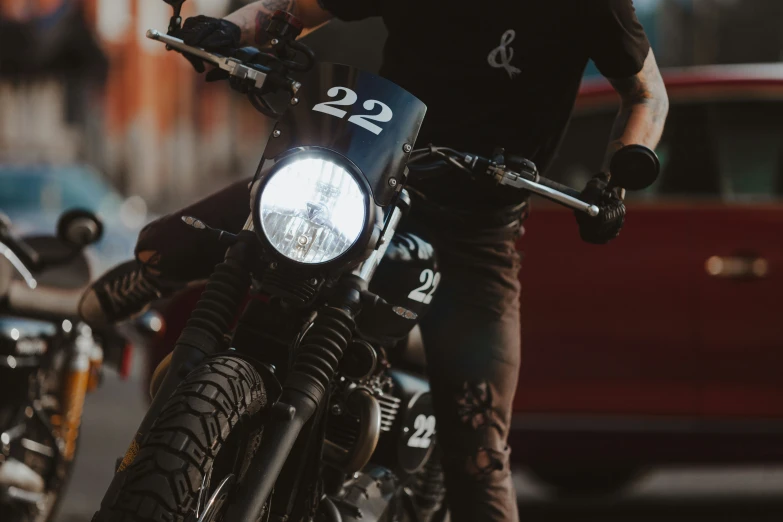 a close up of a person on a motor bike