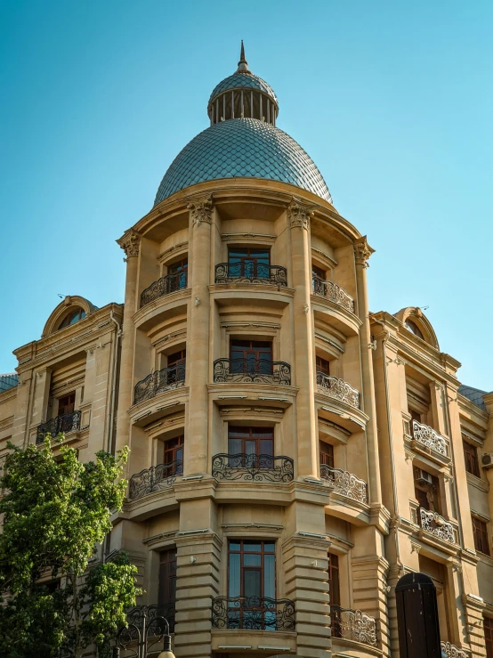 a building with a domed top on the corner