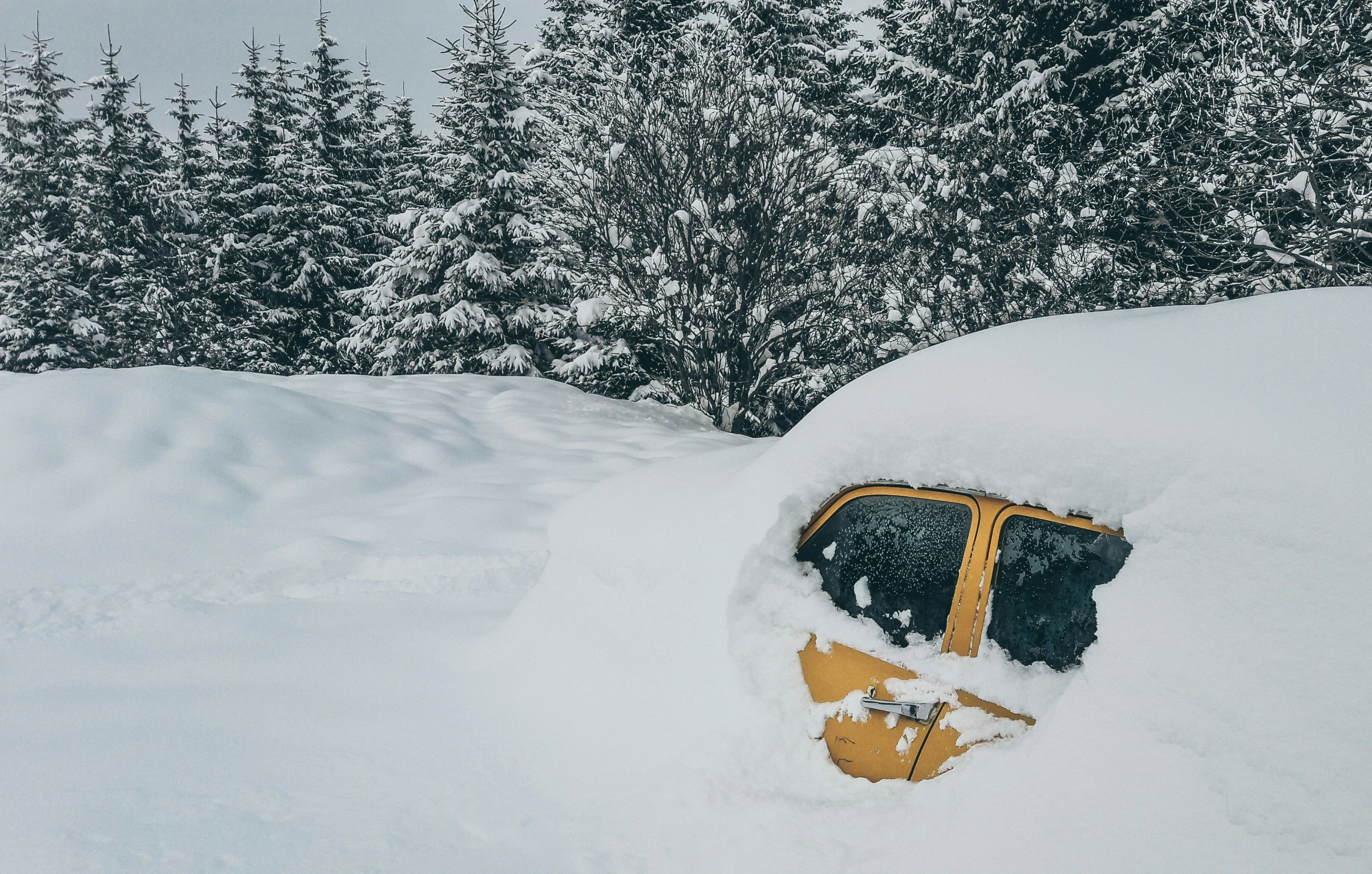 the snowboard is buried in the deep snow