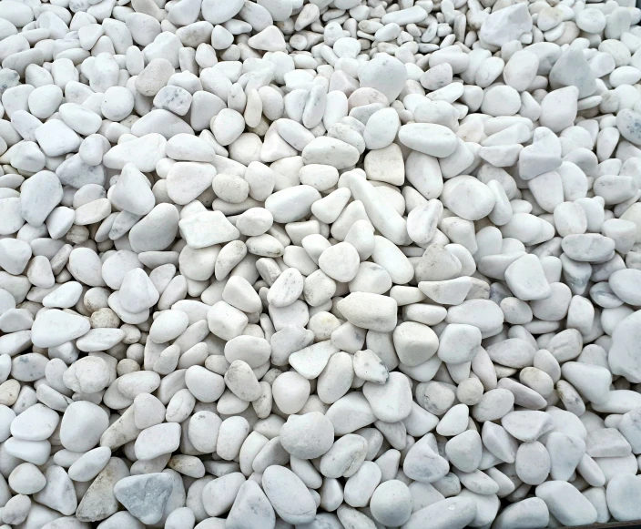 several rocks arranged in the shape of a heart on a table