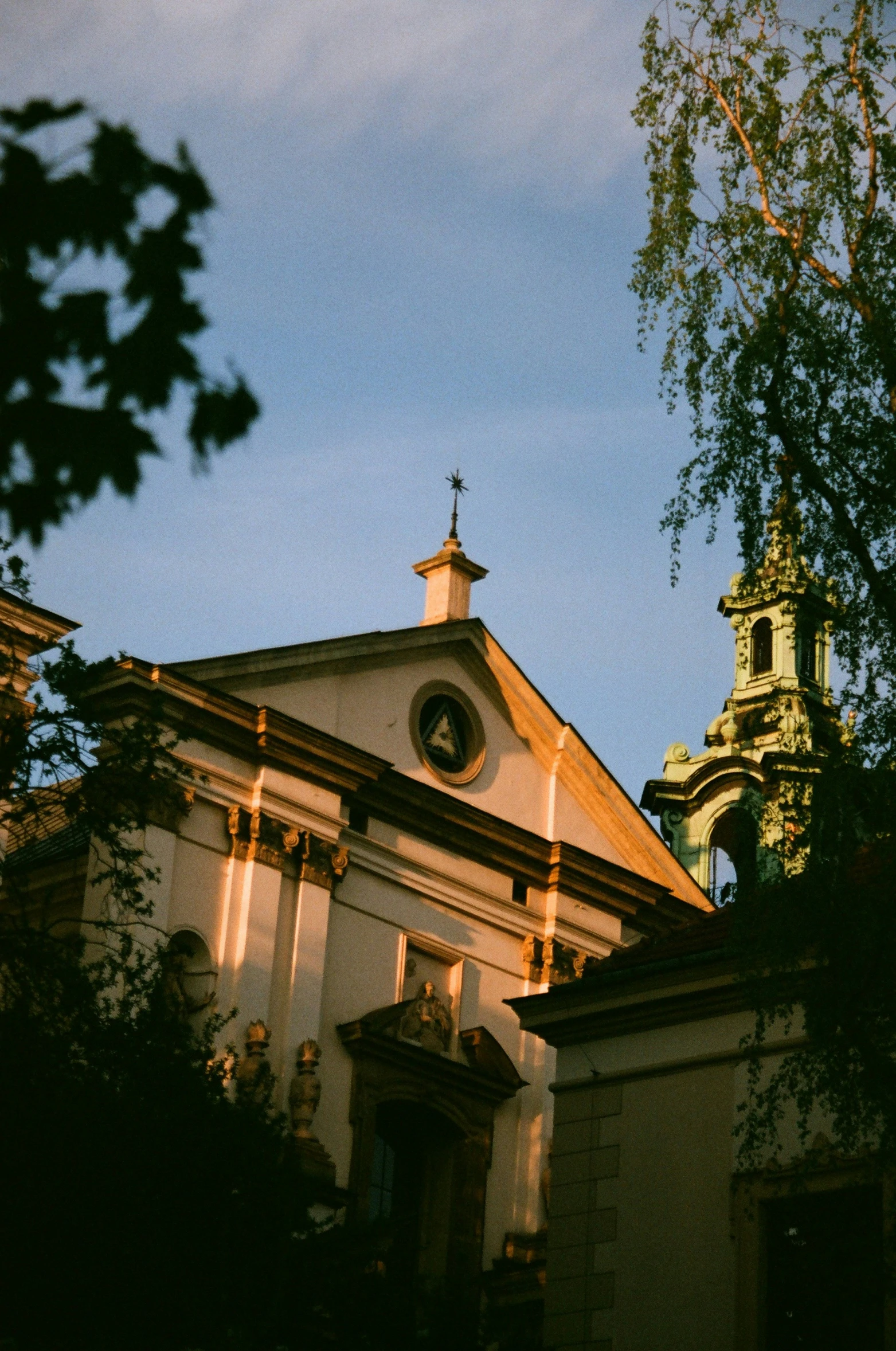 there is a clock tower and a bell tower above the building