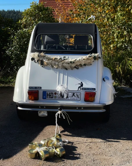 a small car that has flowers on it