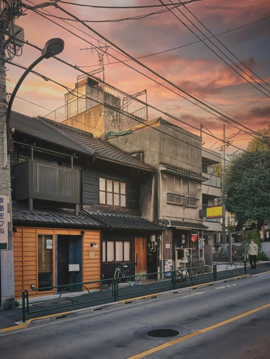 the corner of an alley way at sunset