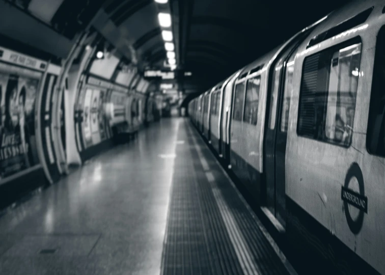 a train is at the station with its door open