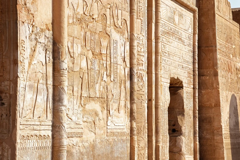 the obelisk and pillars of the temple of den bash in egypt