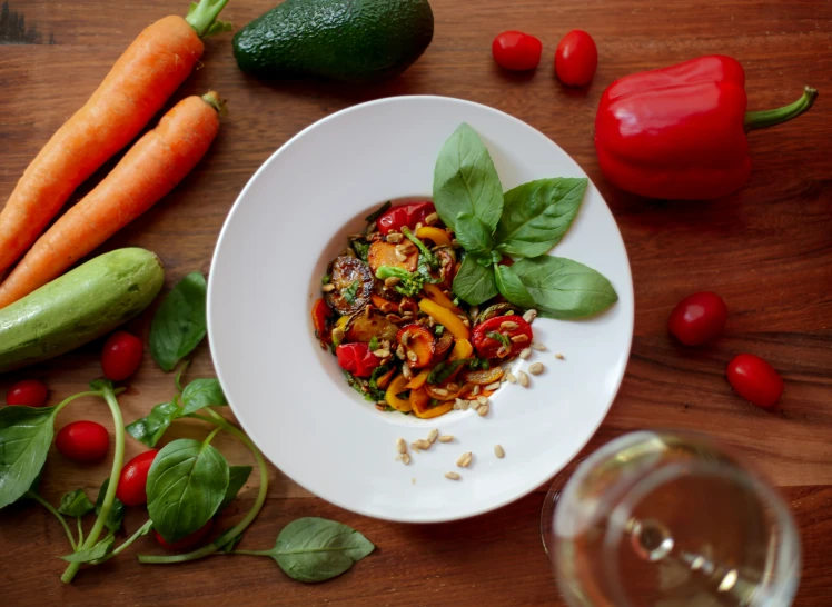 a plate of food sitting on top of a wooden table