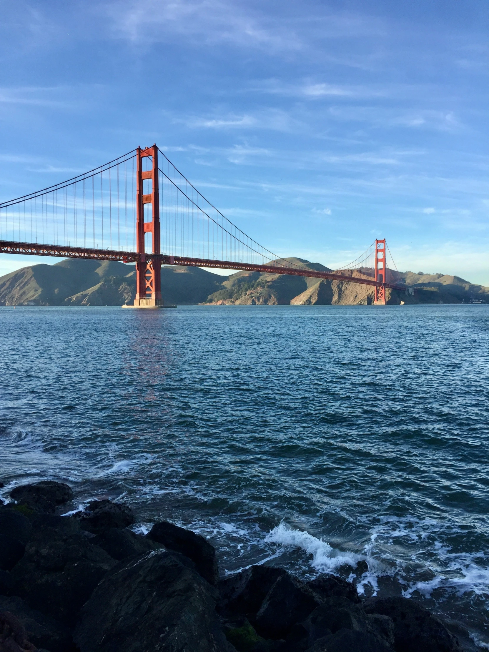 an image of a view of the golden gate bridge from the shore