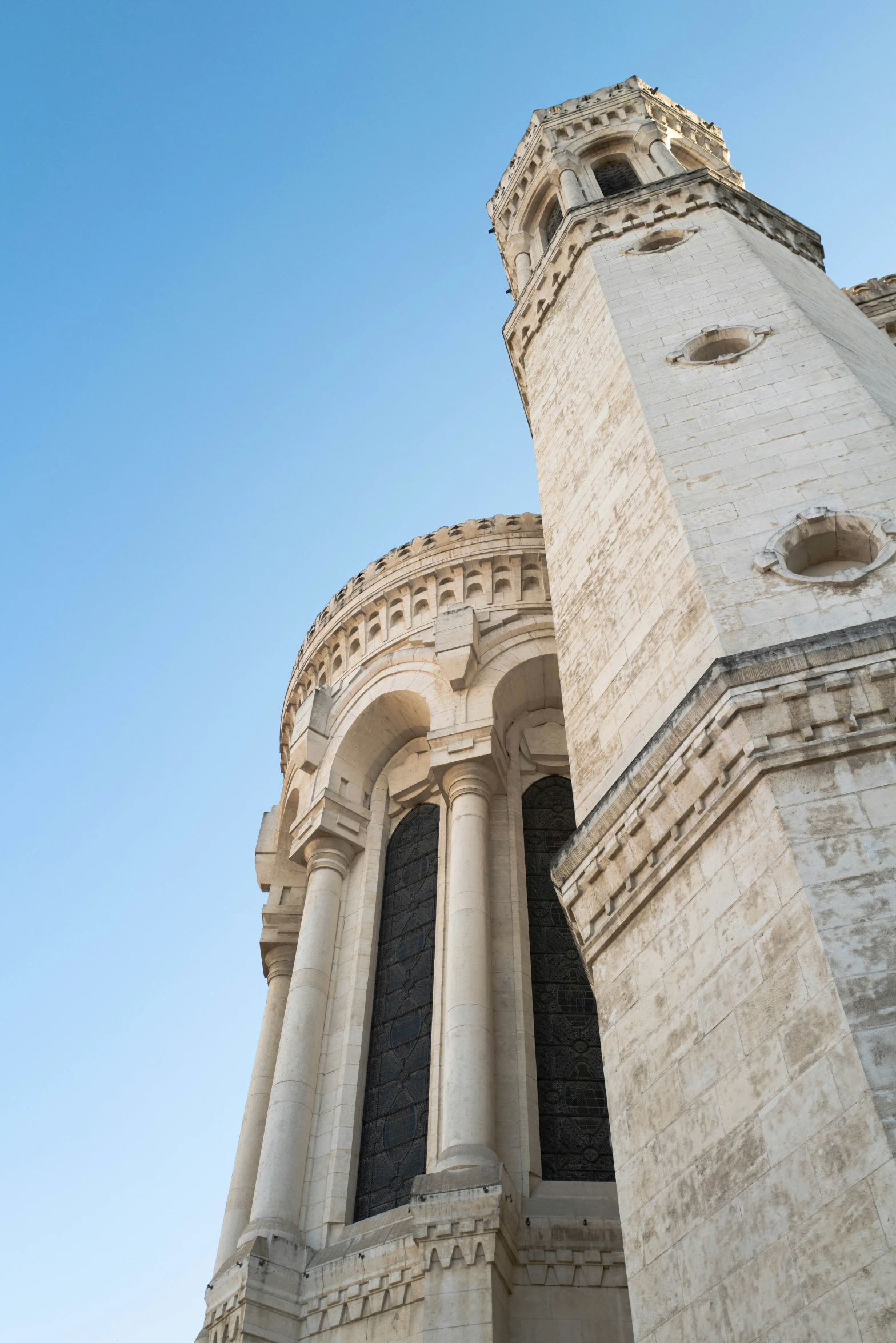 the bell tower has two windows near it