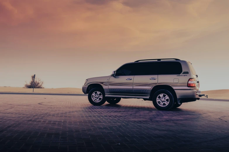 the parked toyota truck is at the bottom of a mountain