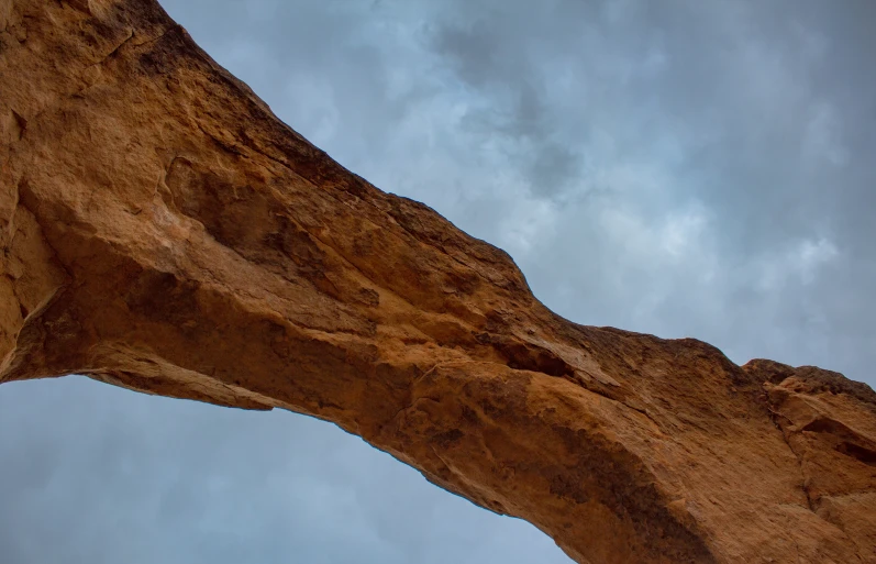 a large, tall rock formation with a very long section