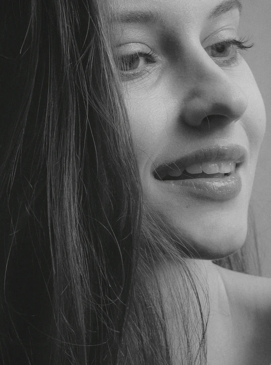 a close up of a person with long hair