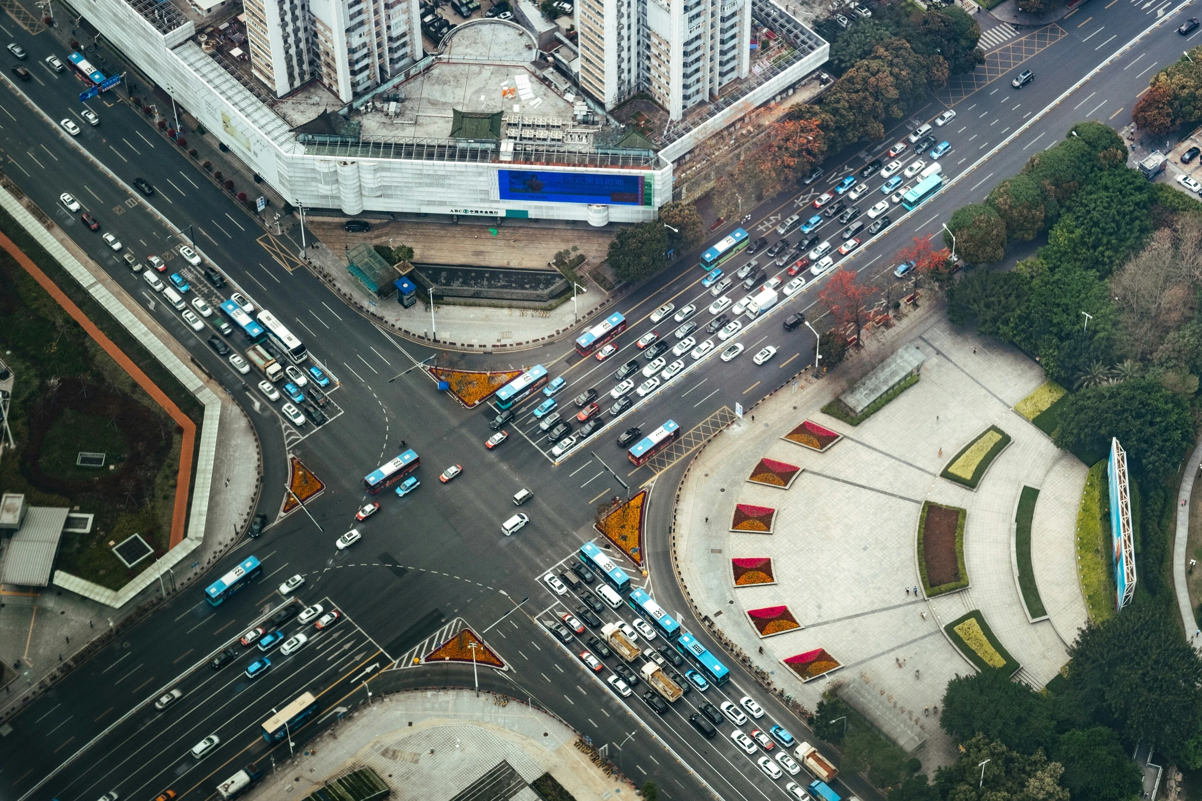 an aerial view shows the city roads and vehicles