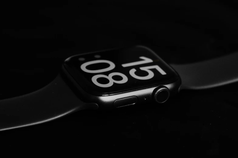 a close up po of an apple watch in black and white