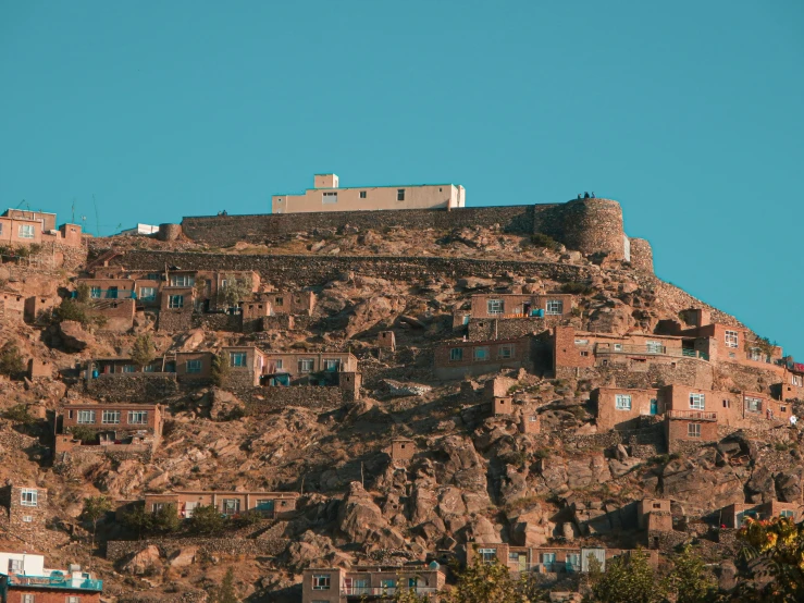 a very high mountain with a lot of houses