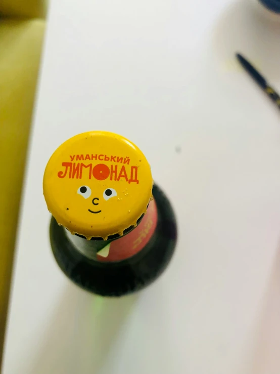 a bottle cap has a little face on it