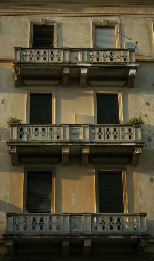 an ornate balcony of a building with many balconies
