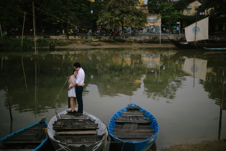 an image of people on the docks with their boats