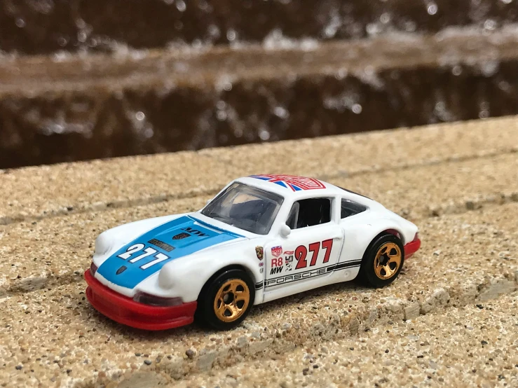 a model race car that is on a surface