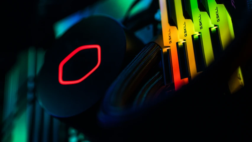 some neon lights are shining brightly on a gaming system