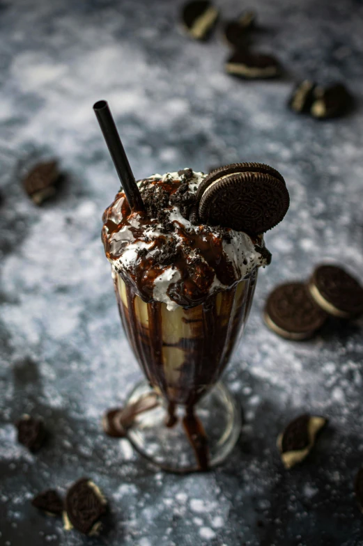 a dessert cup filled with cookies and cream