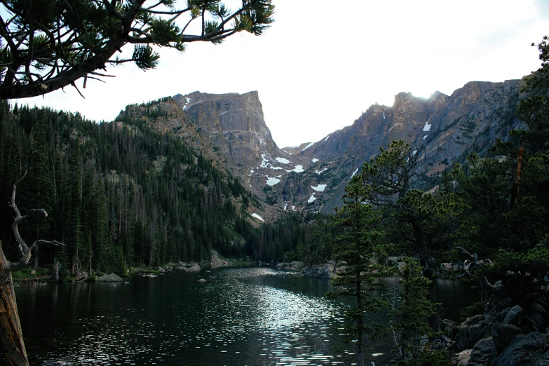 water in the distance is a lake with mountains on it