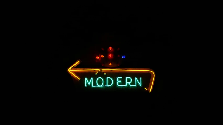 a neon sign for modern with the arrow pointing upwards