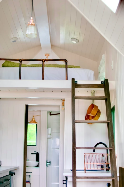 a loft bed has a ladder to the loft bed