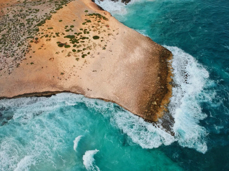 aerial s of the beach, water and rock formations