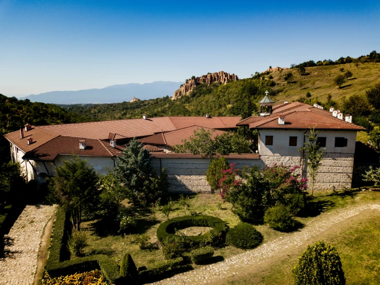 an aerial view of a house with lots of windows