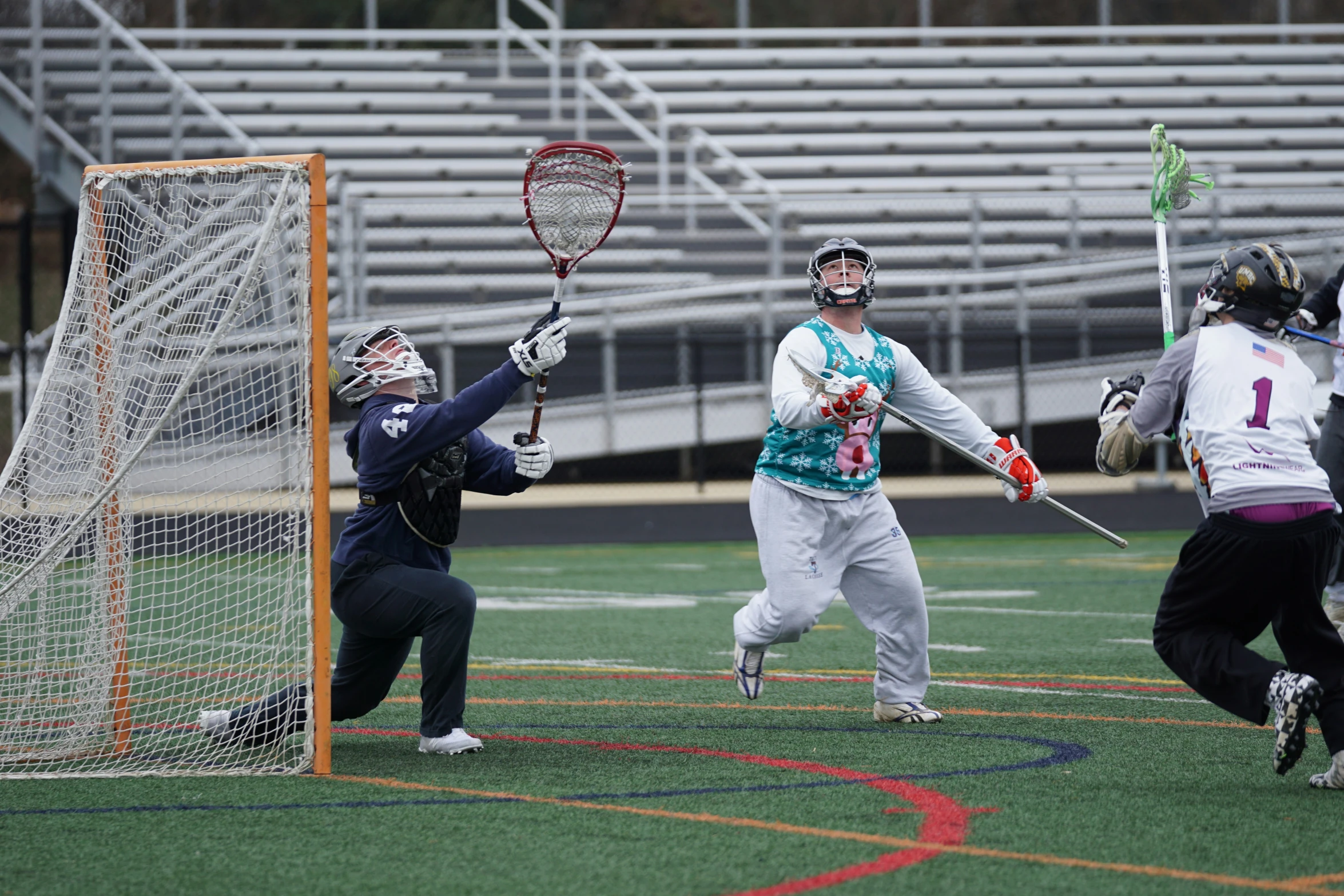 group of people playing field hockey in a stadium