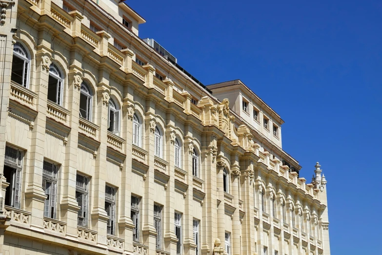 a clock on the side of a large building