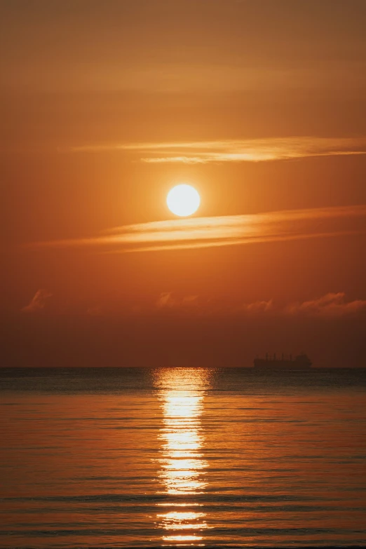 the sun is reflected on the ocean water