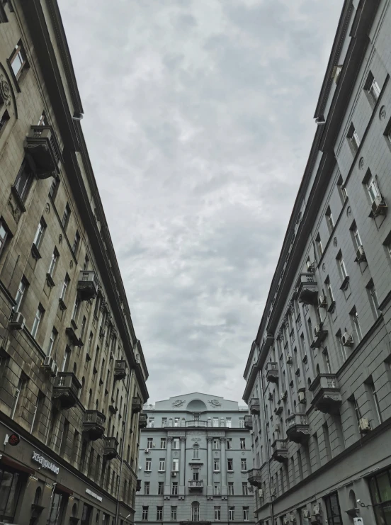 an old city building has very tall towers