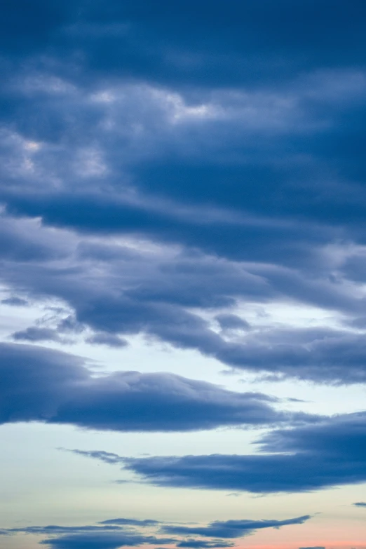 the dark clouds are seen at dusk in this po