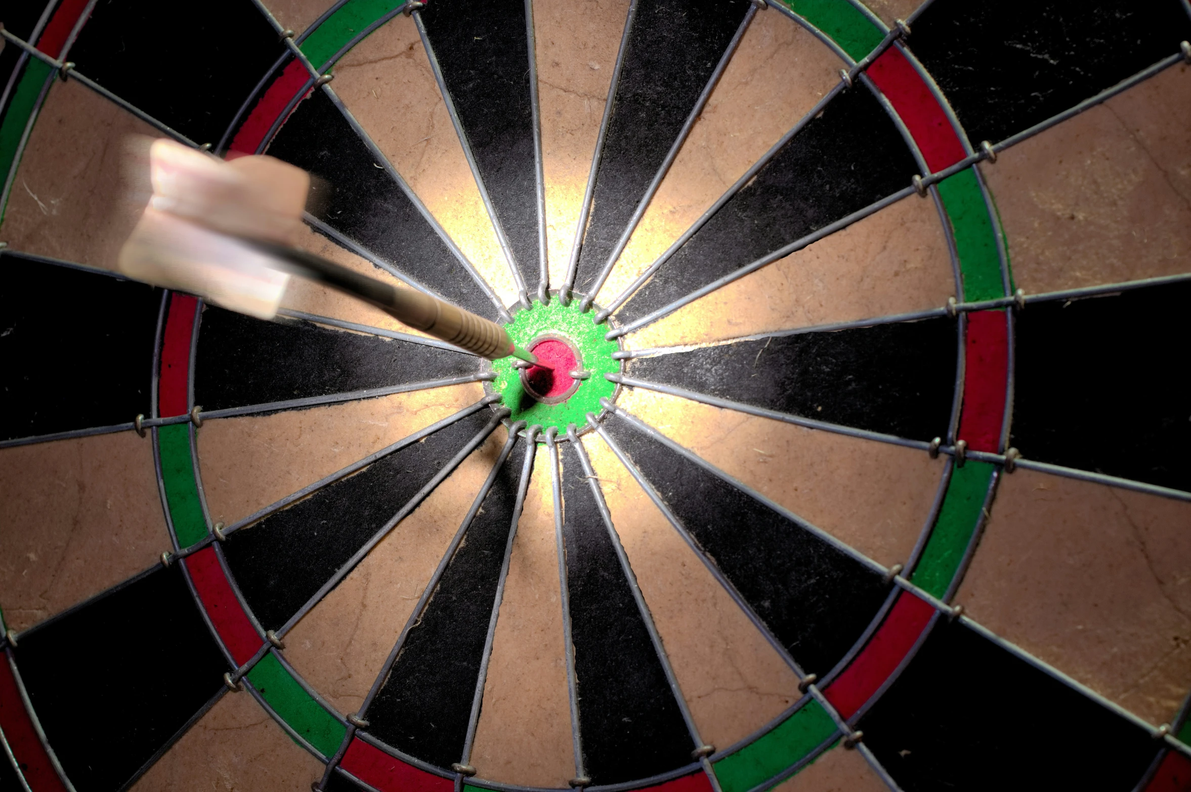 the darts are pointing towards the red target