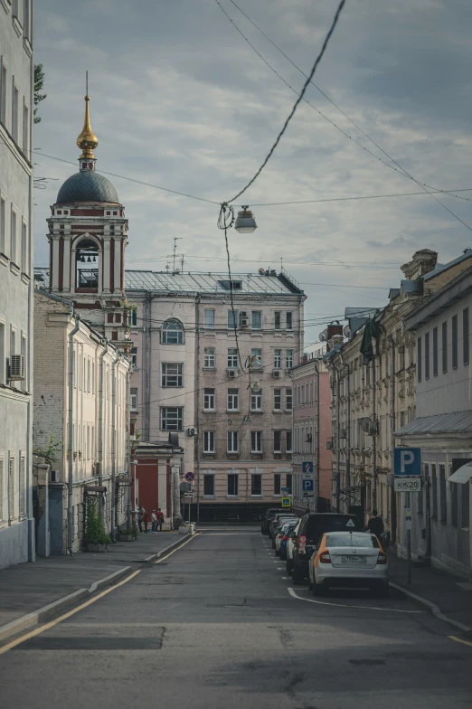 a view of an empty city with a clock tower in the middle