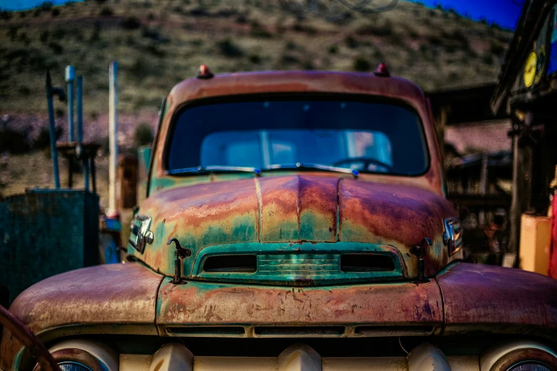 an old truck with rust on it