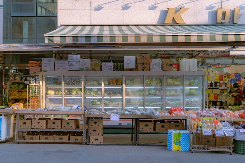 a large fruit and vegetable stand in the city