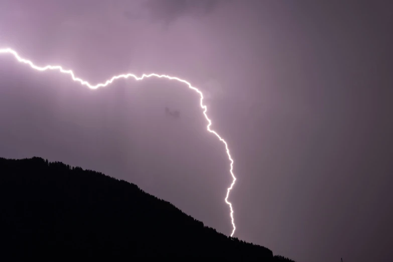 a long exposure s of a lightning strike