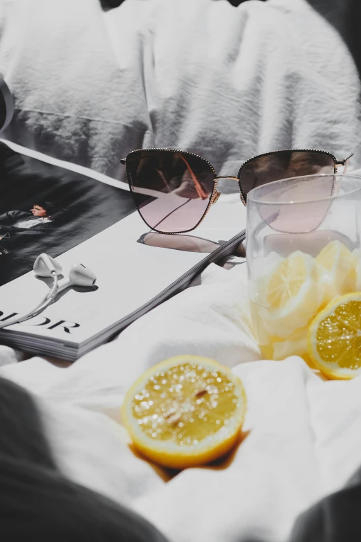 a pair of sunglasses on top of a pillow