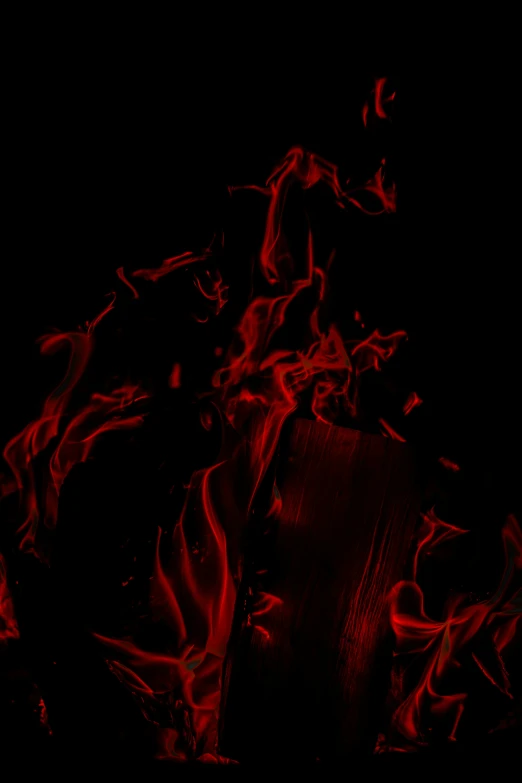 a black and red abstract po with smoke