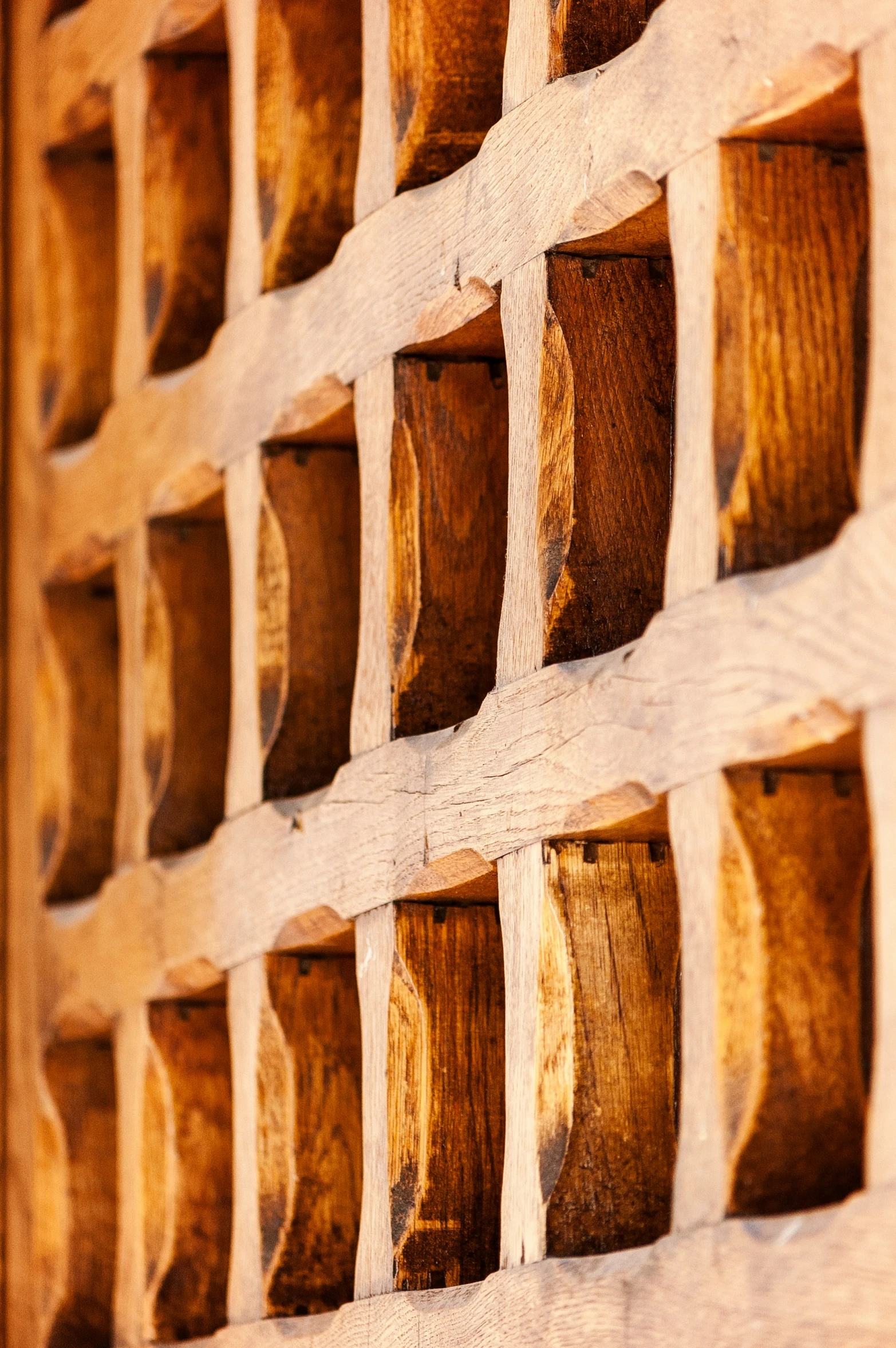 several blocks of wood are arranged to create a wall