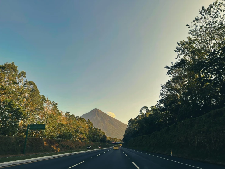 the view of the road towards mountains from inside