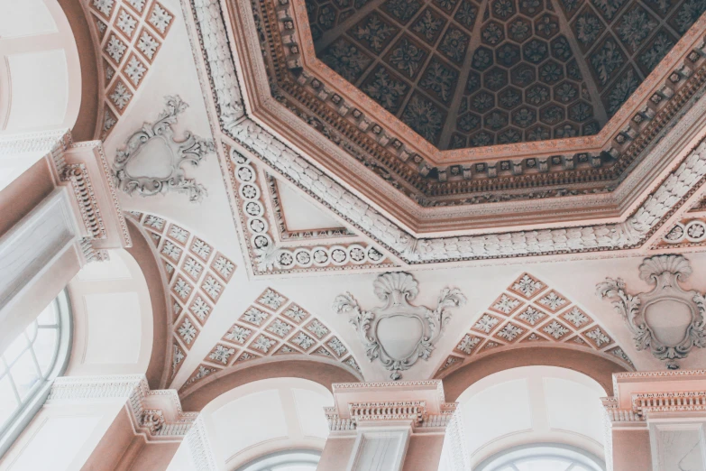 the ceiling in the building has intricate designs